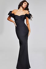 Model wearing Jovani 41084 black off-the-shoulder dress with ruffled sleeves, front view.