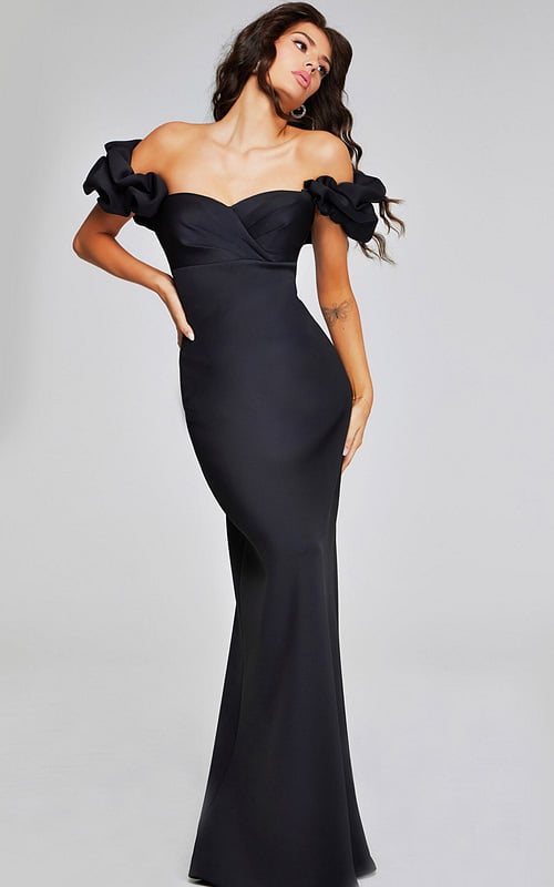 Model wearing Jovani 41084 black off-the-shoulder dress with ruffled sleeves, front view.