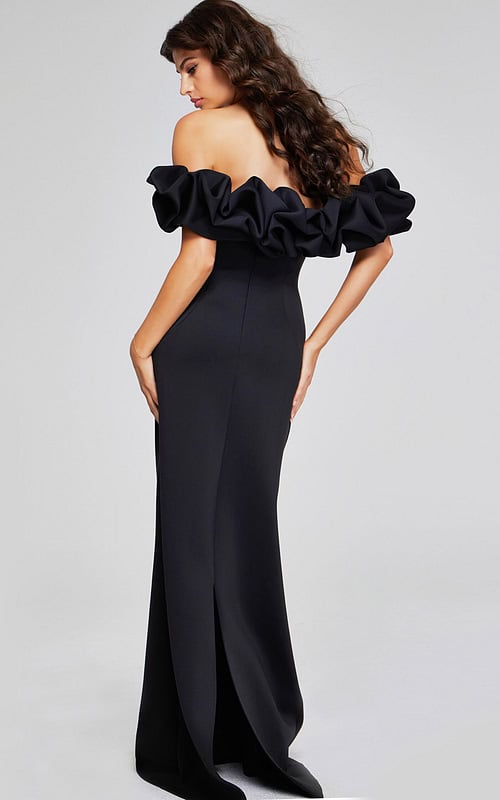 Model wearing Jovani 41084 dress showing back view with ruffled sleeves.
