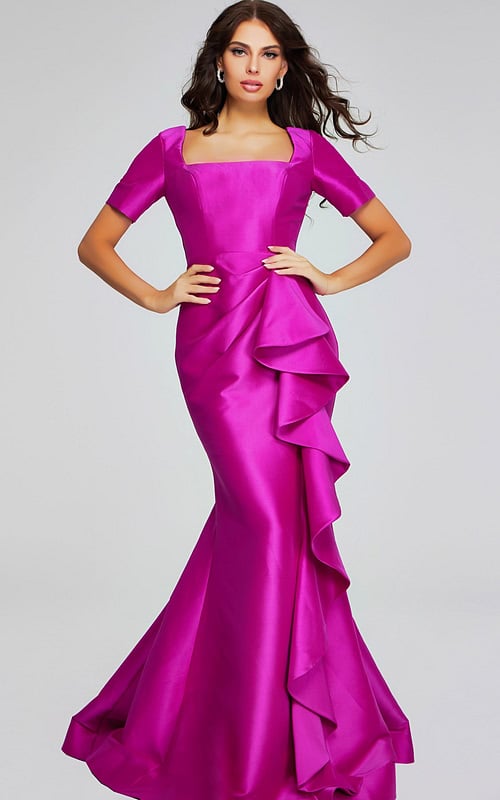 Model wearing Jovani 41128 featuring a mermaid silhouette, square neckline, and short sleeves in lilac.