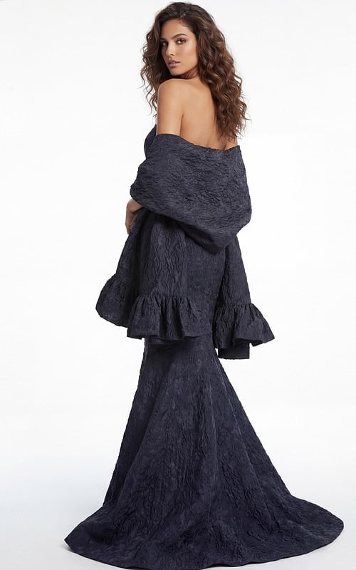 Strapless mermaid gown in textured fabric with dramatic floor length train