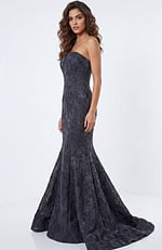 Side view of strapless mermaid gown with structured silhouette and flowing train