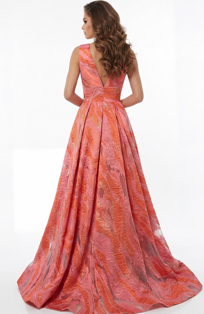 A line gown with open V back and flowing floor length skirt