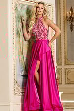 Model wearing Jovani 41186 fuchsia gown with high neckline and embellishments, angled front view