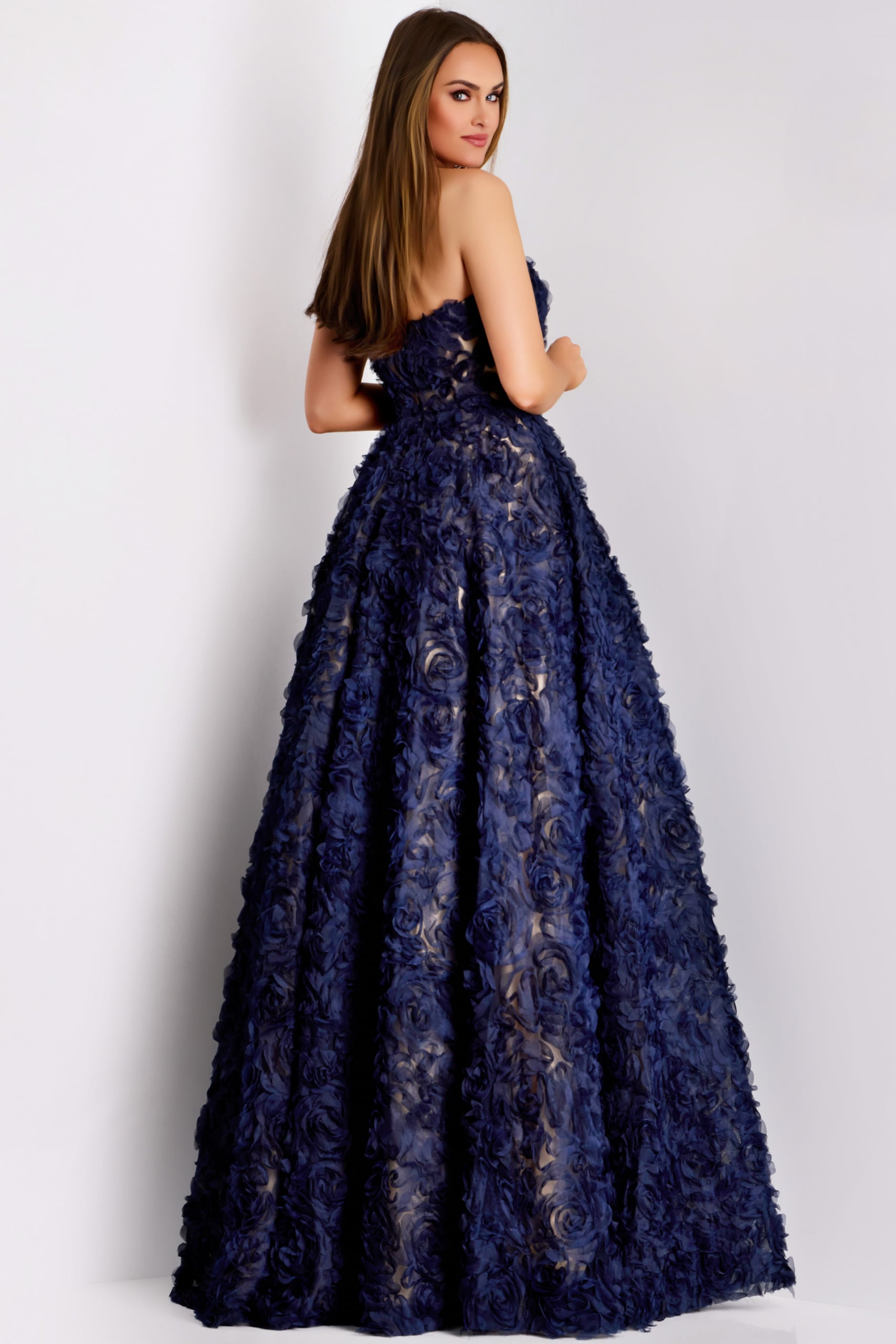 Back view of A-line navy evening dress with 3D rose detailing