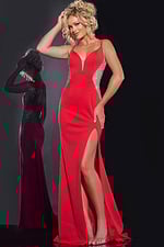Model wearing Jovani 42002 red gown with V-neckline and high slit