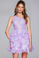 Model wearing Jovani 42016 dress in lilac with front view showing the one-shoulder and sequined floral lace.