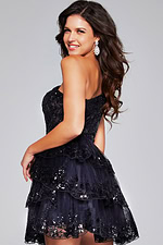 Back view of Jovani 42016 dress in black, highlighting the sequin lace and layered skirt.
