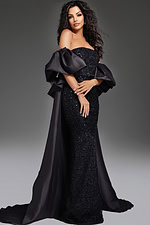 Model wearing Jovani 42137 black strapless gown, front view with arm detail