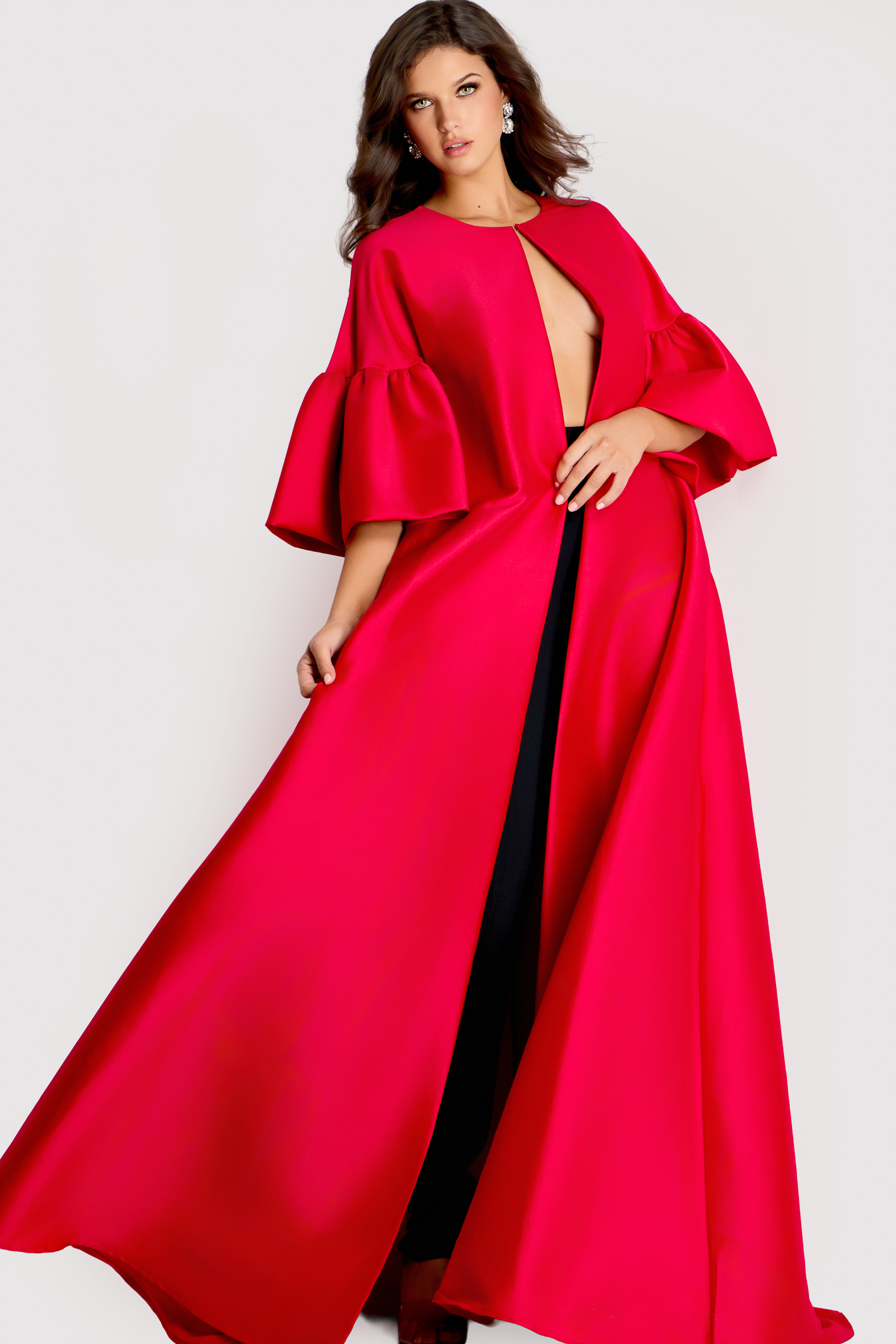 42160 Dramatic floor-length cape with flared sleeves and open front, styled in bold satin fabric for a statement look.