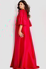 Dramatic satin cape gown featuring voluminous tiered sleeves and a flowing full-length silhouette for an elegant statement look.