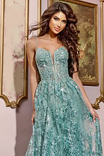 Front view of Jovani 42199 green gown with semi-sheer embellished overlay
