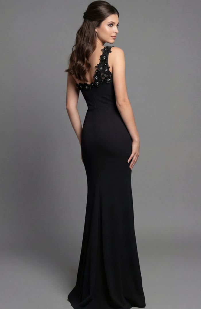 Back view of a fitted gown with floral appliqué detail and clean open back line