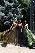 glamorous gold strapless gown with floral accents and cutout detail