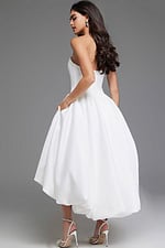 Model wearing Jovani 42345 off-white high-low dress, back view