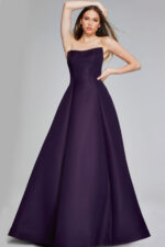 Model wearing Jovani 42347 purple strapless A-line evening gown, full front pose
