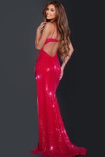Model wearing Jovani 42379 burgundy gown with open back design, back view