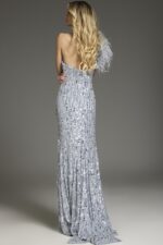 Back view of model wearing Jovani 42426, featuring the elegant drape and sequins.