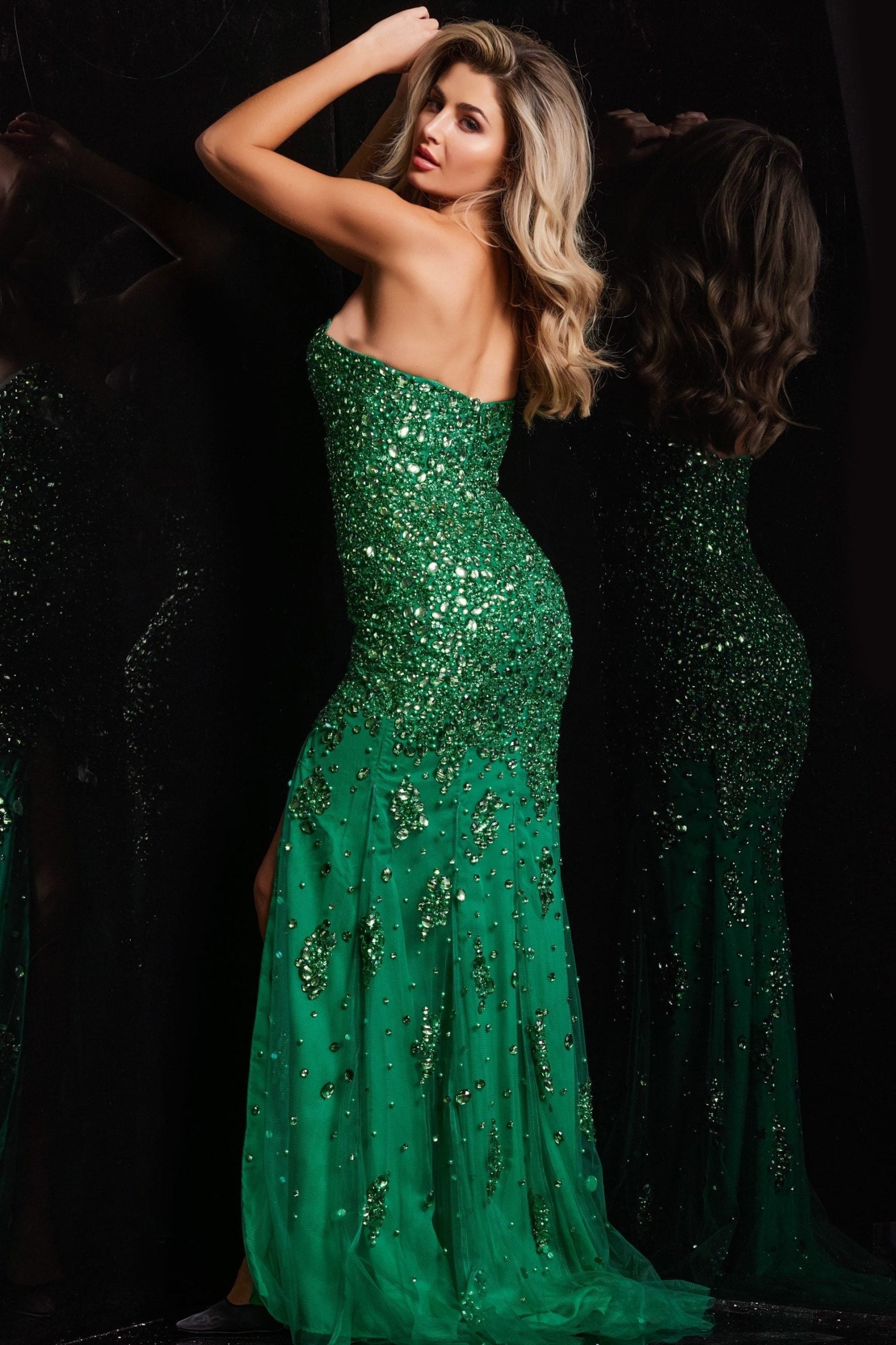 model showing back of Jovani 4247 green gown with beadwork