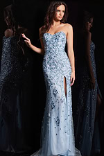 Model dressed in Jovani 4247 blue gown with a graceful side slit.