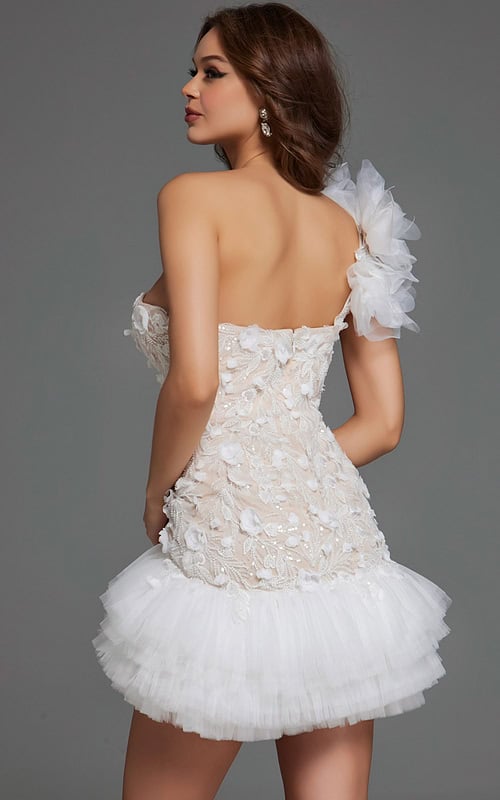 Model wearing Jovani 42536 dress in ivory, back view with intricate floral design.