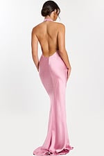 Back view of low open-back mauve gown with elegant train.