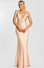 Sleek satin blush gown with deep V-neck and spaghetti straps