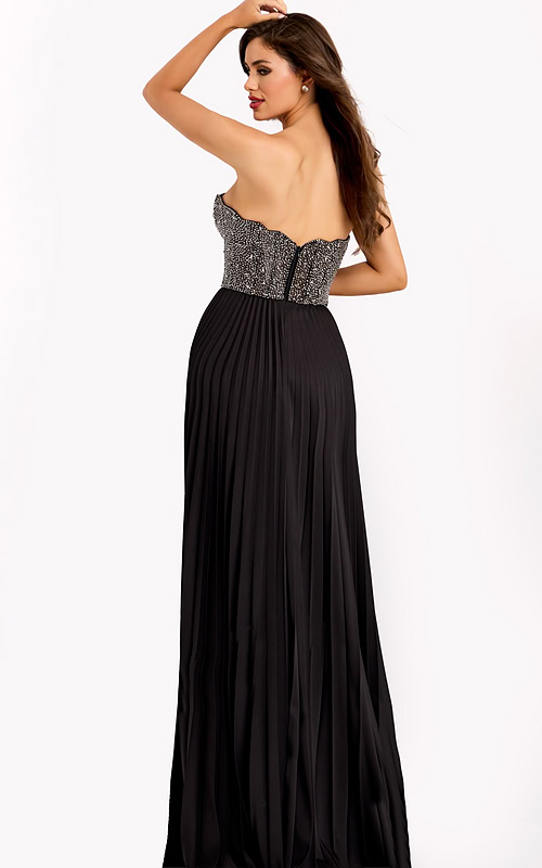 Elegant black gown with pleated skirt and embellished bodice