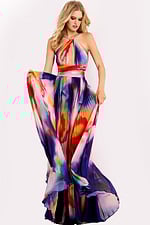 Flowing A-line gown with high slit and vibrant rainbow pattern