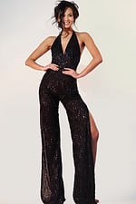 Glamorous beaded jumpsuit with deep neckline and high side slits