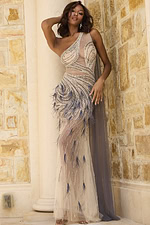 Model in Jovani 42785 nude dress, elegant one-shoulder design with flowing silhouette.