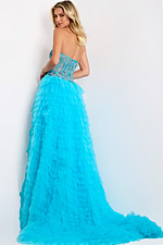 Layered tulle evening dress with high slit and extended train