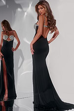 model wearing Jovani 42960 black gown, showcasing the elegant open back