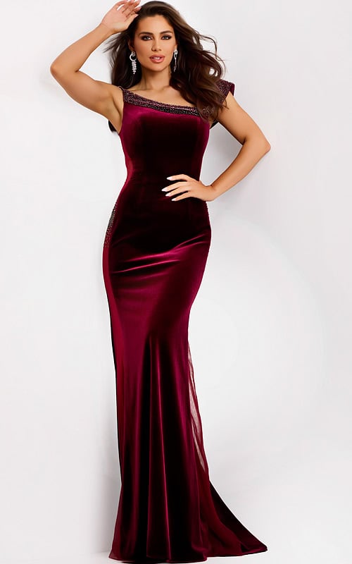 Burgundy velvet gown with one-shoulder neckline and beaded trim