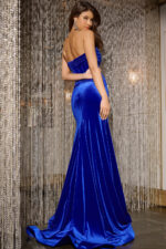 Model in Jovani 43066, Royal Blue velvet gown with a strapless neckline and high slit.