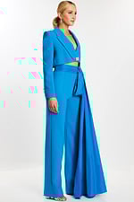 Side view of peacock blue pantsuit with satin sash and rhinestone button