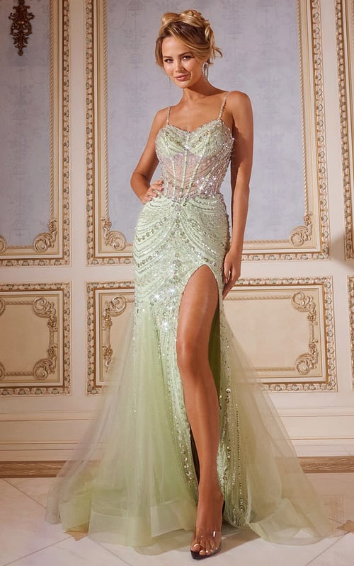 Model wearing Jovani 43189 green gown with delicate beading, floor-length and high slit.