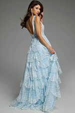 Back view of a tiered ruffle ball gown with a low V-cut