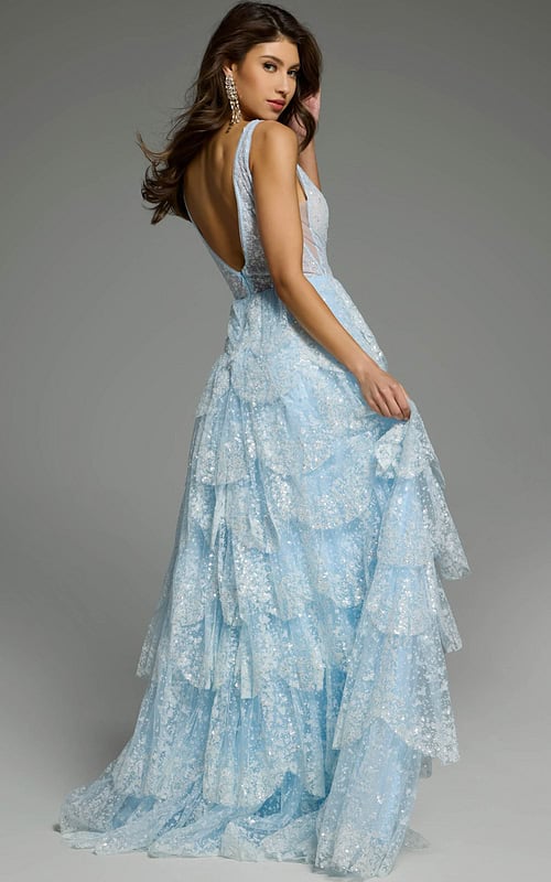 Back view of a tiered ruffle ball gown with a low V-cut