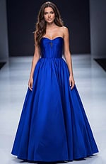 Strapless ball gown with structured bodice, softly gathered waist, and full flowing skirt creating a classic, elegant silhouette