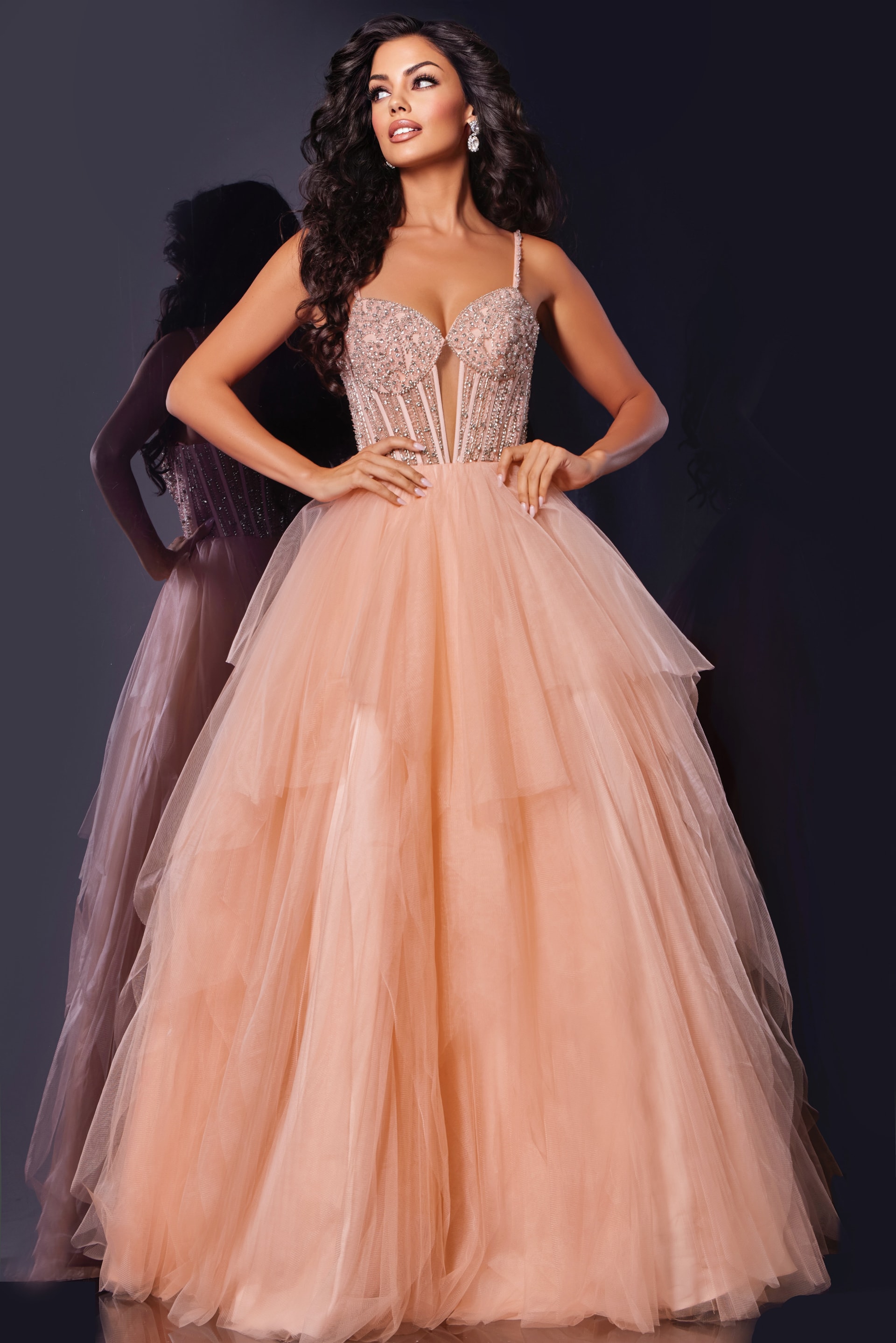 43254-7 Model wearing Jovani 43254 blush ball gown with beaded bodice and tulle skirt