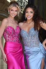 beaded corset dress with high slit - two girls front, blonde updo dark curly hair smiling