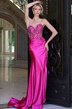 fuchsia beaded corset dress with high slit - front full body, arm raised hand on hip slit