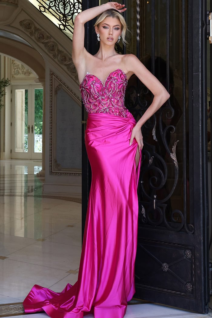 fuchsia beaded corset dress with high slit - front full body, arm raised hand on hip slit