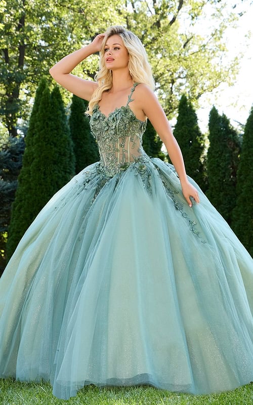 model wearing 43437 green ball gown with lace detailing and sweetheart neckline