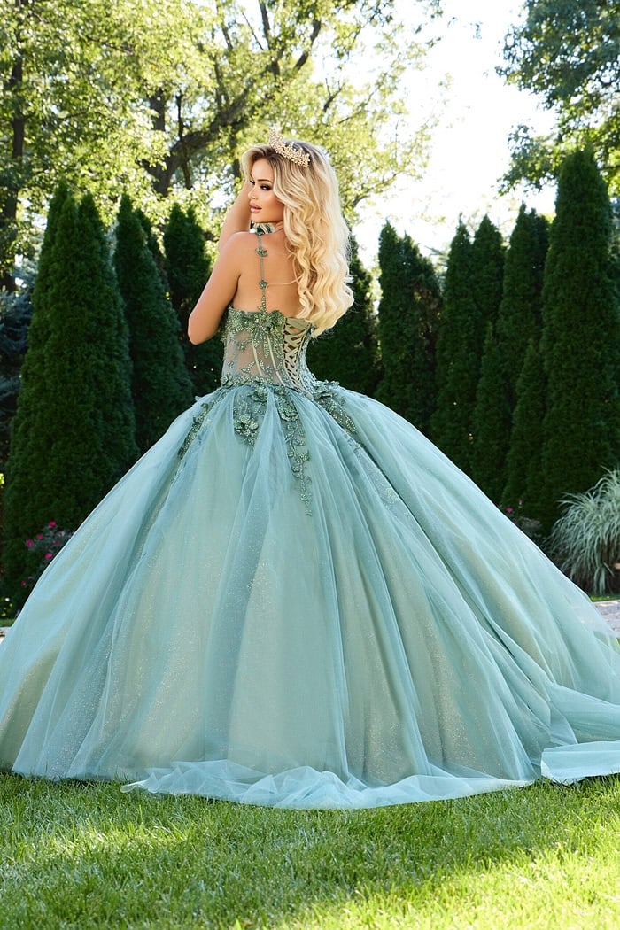 back view of model wearing 43437 green ball gown with lace-up design