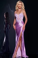 Model wearing Jovani 43569 lilac gown with floral embroidery and high slit.
