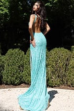 Open-back sequin dress with fitted bodice and dramatic sweep train