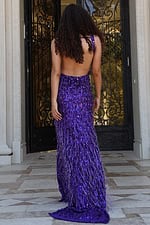 plunging sequin gown with high slit and open back