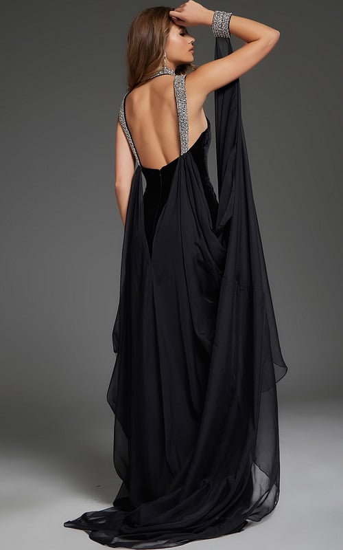 Back view of model wearing Jovani 43696 black gown showing elegant flowing fabric